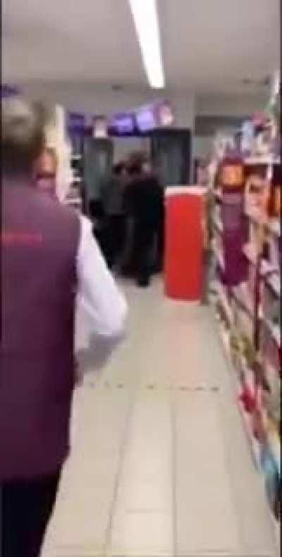 Public freakout in a supermarket with WWE dubbed walk in.