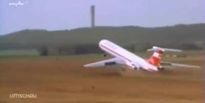 A pilot lands a plane on a field so it can be placed at the museum nearby in Germany, 1989. This was done because it was cheaper than disassembling, transporting, and reassembling it.