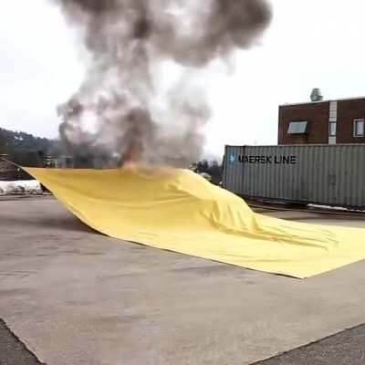 Fire fighting blanket for cars to reduce the use of water or chemicals.