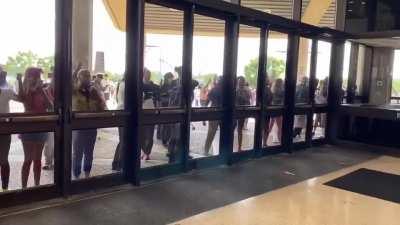 People attempting to vote in Kentucky after the doors were closed on them.