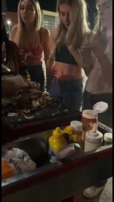 Group of drunk college girls harassing and stealing food from a street vendor