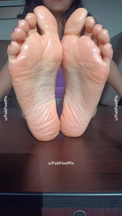 Oiled up soles for a massage