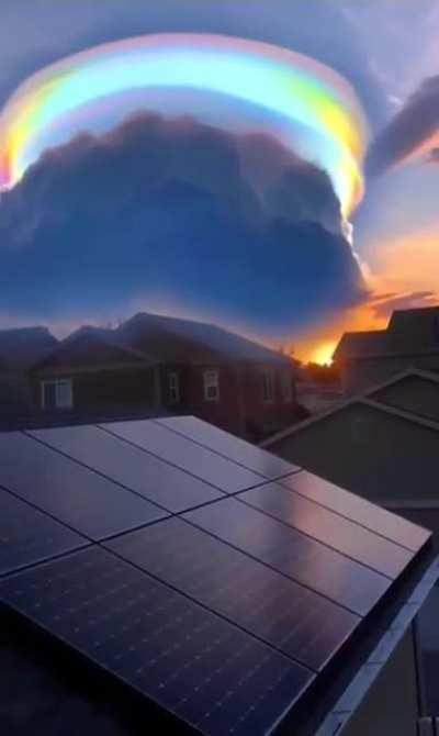 An iridescent lenticular cloud or cover for UFO