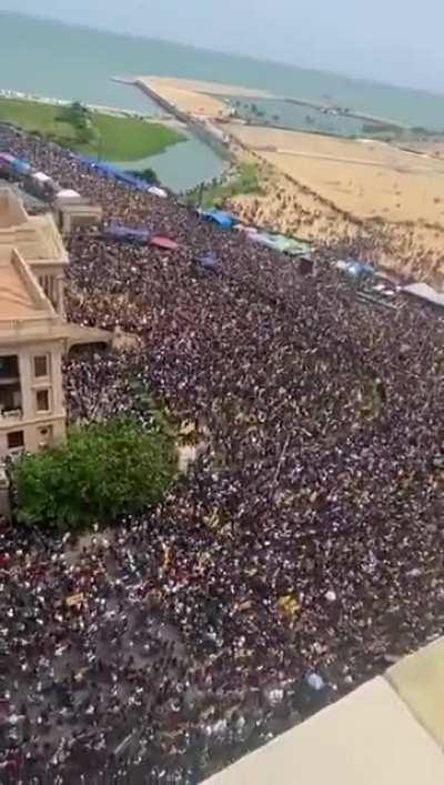 Hundreds of Thousands of Sri Lankans gather for a protest against the President who is responsible for the current crisis. His Office and Official Residence has been stormed. He is expected to resign. The Power of the People!