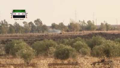 Opposition BGM-71 TOW team target an SAA bulldozer and harass its crew with MG fire - Damascus-Daraa Highway - 2014