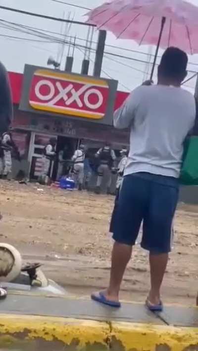 Mexican National guard kick out looters from store in the aftermath of hurricane John in Acapulco