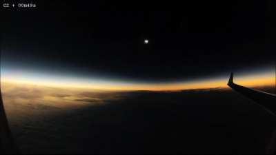 Watch from an airplane window as the moon's shadow moves over the Earth during a total eclipse in this amazing timelapse captured by engineer Sylvain Chapeland.l