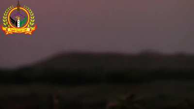 FSA camera captures the impacts of bursts of AA fire on a distant SAA controlled hilltop - Tal Um Houran - 5/15/2014