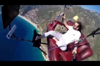 Paragliding with a sofa