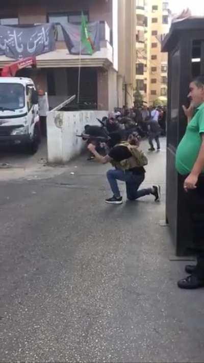 Beirut, Lebanon. The guy in the green shirt just a lit a cigarette and stood there