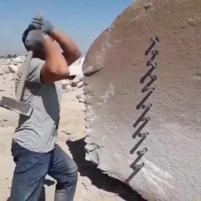 Splitting a rock Better than cutting it.