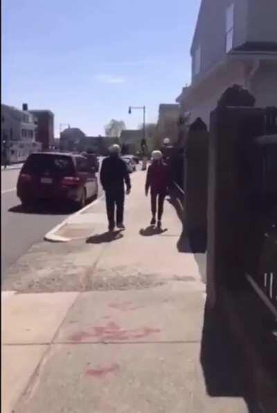 Karen freaks out over painted directional signs on the sidewalk.