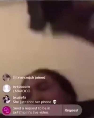 Girl shoots her phone on IG live