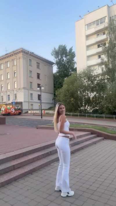 Polina Malinovskaya - Showing Off her White Pants and Tank Top in the Street (IG Story Clip)