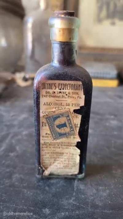 1800s bottle of alcohol and opium for children with head colds