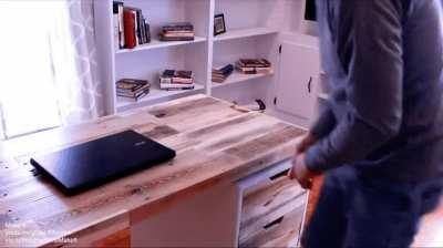 Desk with hidden laptop compartment