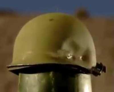 How army helmet deflects bullets.