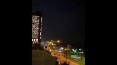 Israeli Iron Dome intercepting a rocket barrage just before it falls down on a city