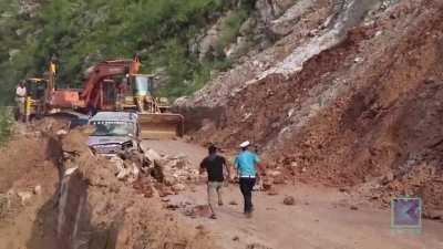 Rock fall from landslide hits vehicles in Nepal today.