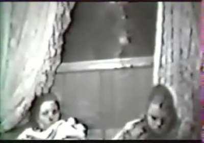 Vintage video of something creepy outside a window