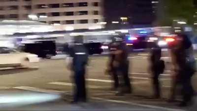 Police fire pepperball round at uninvolved motorist who was stopped at a traffic light. He got out to yell at them because his pregnant girlfriend is in the vehicle, so they opened fire on them. Denver, CO.