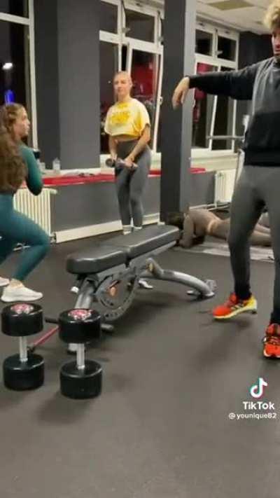 Disrupts people working out and nearly breaks his back, all for a TikTok video