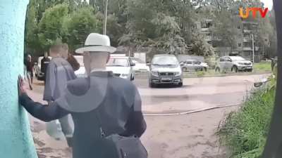 Grandpa in Russia pulls weird big bottle of liquid from the bushes, it explodes. 