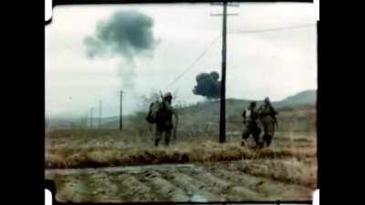 US Marines look on as air strikes soften suspected North Korean positions near Wonju - 1951