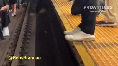 protesting on subway tracks in NYC.