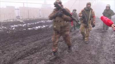 Separatist fighters of the DPR in the streats of Volnovakha