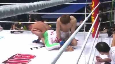 With bulldog tenacity, Satoru Kitaoka sinks in an achilles lock to defeat Takanori Gomi and become the first Sengoku Lightweight champ in 2009. In 72 fights the 