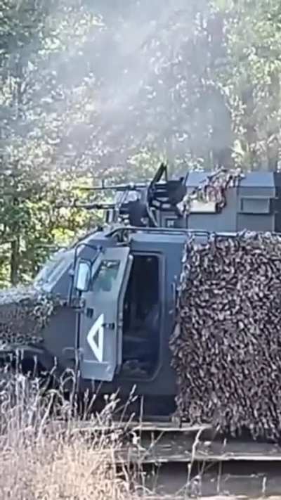 Ukrainian soldiers suppress Russian soldiers with heavy machine gun fire from a greater distance. Kursk region, somewhere near Tetkino. September 2024.