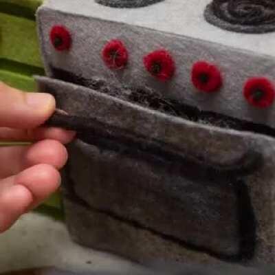 Fiber artist Andrea Love creates a cooking scene using stop motion.