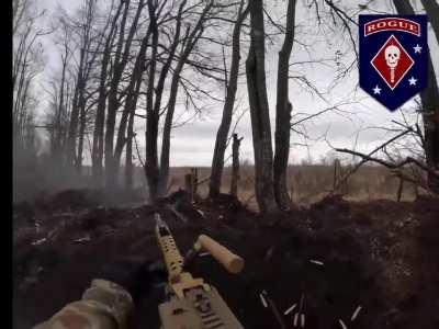 Volunteer US Marines Teem Collin Lee operating the MG5 machine gun. Near the city of Kupyansk, Kharkiv. Rogue team, GUR. November 2023