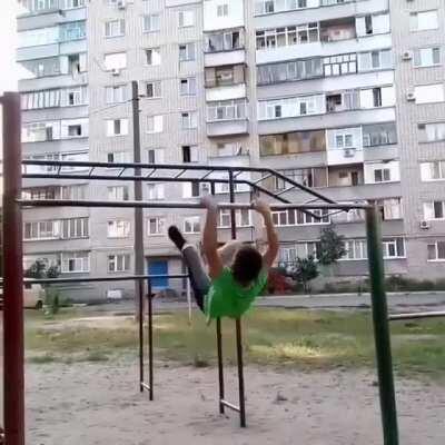 This kid's hang bar skills