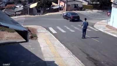 Guy jumps through window of moving car and saves it from crashing