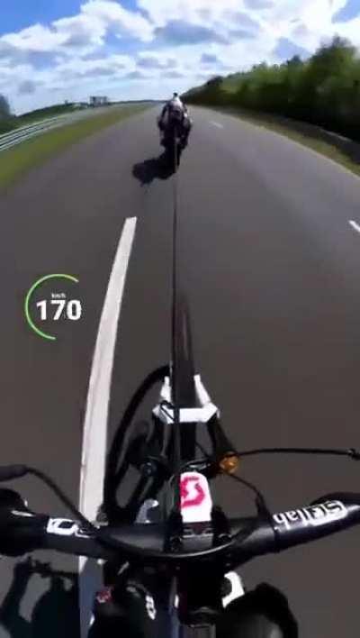 How fast can you pull a bike behind a motorbike.