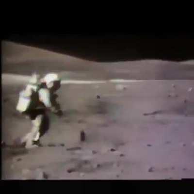 This rarely seen footage shows NASA astronauts struggling to walk on the moon