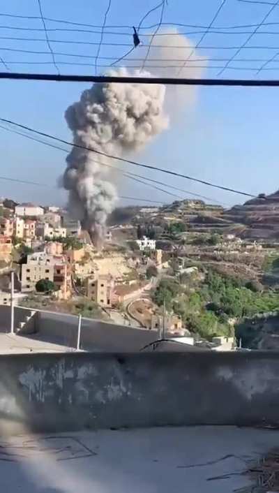 One of Hezbollah ammunition depos exploded under ground, creating this smoke cone