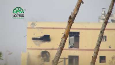 Islamic Front sniper manages to snipe the base of an SAA 9M133 Kornet using an anti-materiel rifle - Bureij Front, Aleppo - 12/25/2014