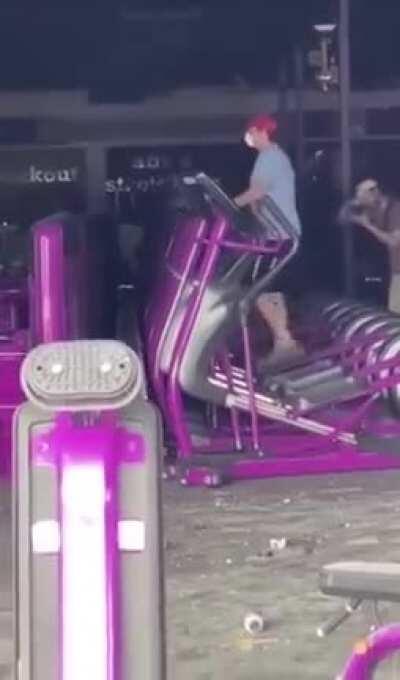 Guy gets his workout on during the riot