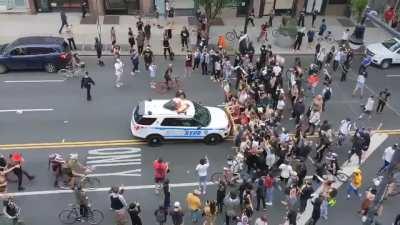 NYPD Officer Drives Car Into Crowd of BLM Protestors