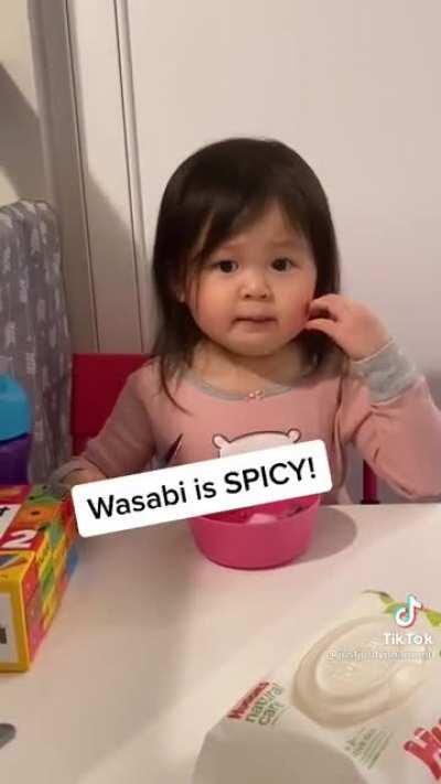 Her mom accidentally had wasabi on her chopsticks and fed it to her