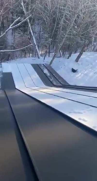 Removing snow from new metal roof