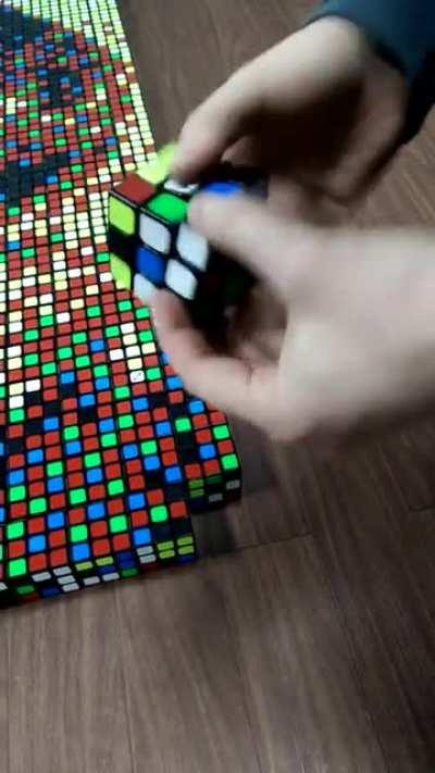 Man makes mosaic using Rubik's Cubes