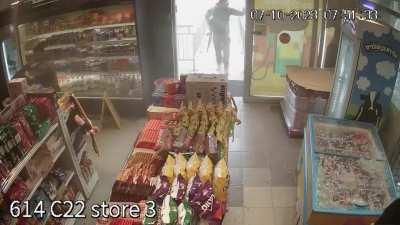 CCTV footage of the October 7th attack in which a gas station is looted while the employees manage to escape