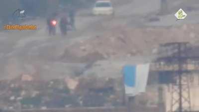 Jaysh al-Mujahideen firing a TOW missile at gathering SAA troops, killing multiple instantly (al-Assad suburb, Aleppo)