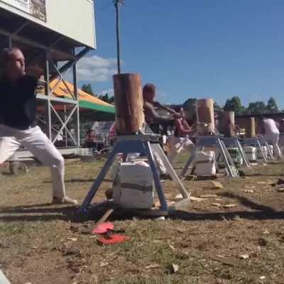 One-Armed Man Destroys Wood Chopping Competition