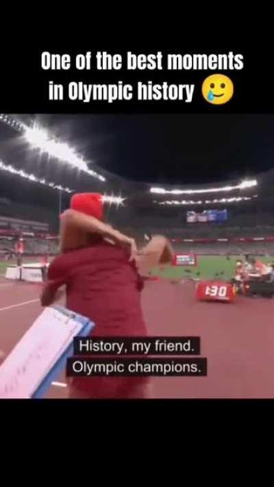 Guy in red shares his gold with his bestfriend