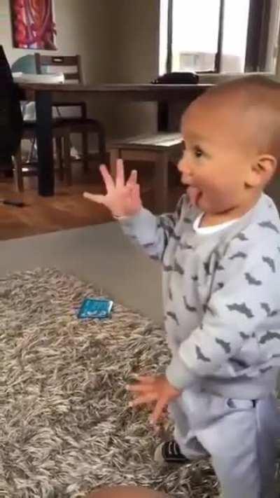 A Young Maori Warrior Performs A Haka